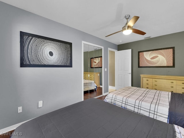 unfurnished bedroom with connected bathroom and ceiling fan