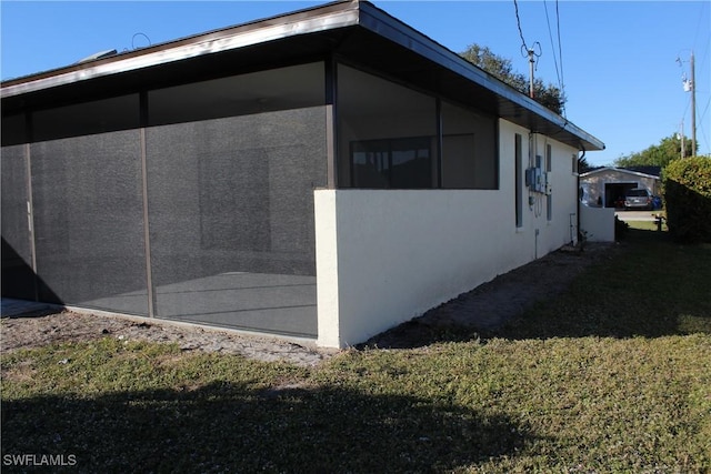 view of home's exterior featuring a yard