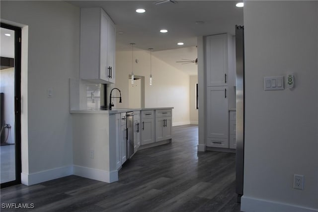 hallway with dark hardwood / wood-style flooring and sink