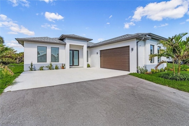 view of front of home with a garage