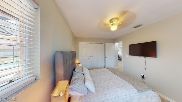 bedroom with a closet and ceiling fan