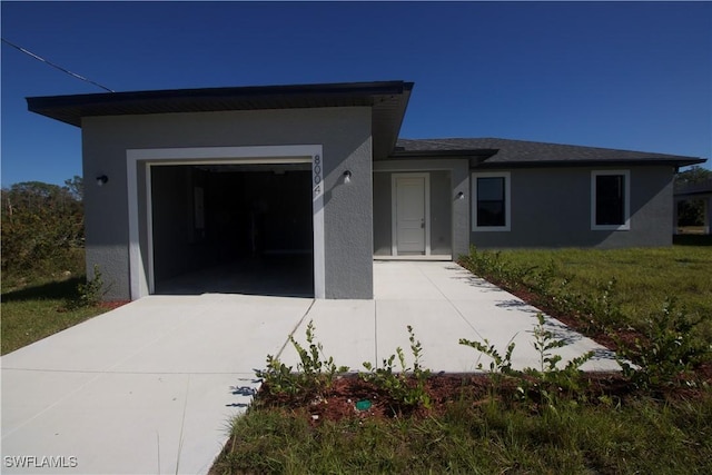 view of front of home with a garage