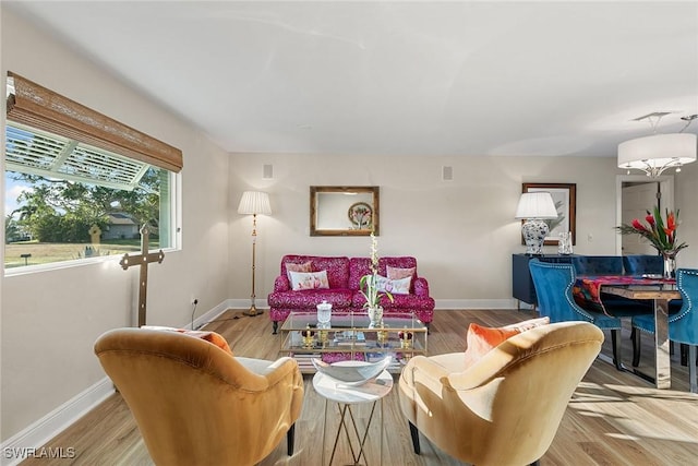 living room with light hardwood / wood-style flooring