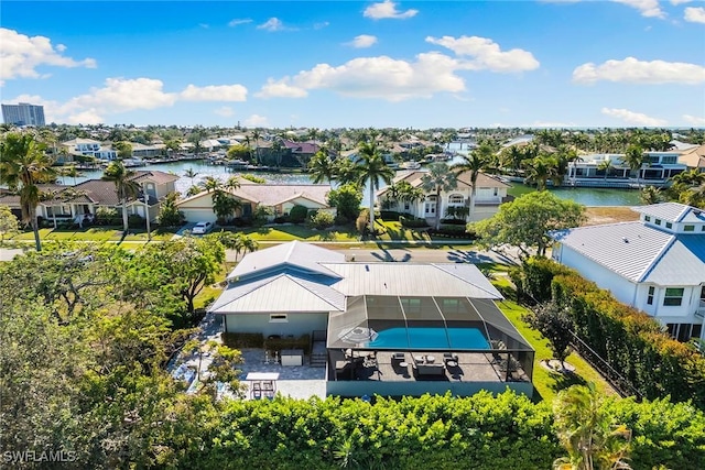 drone / aerial view with a water view