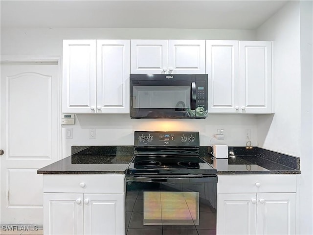 kitchen with white cabinets and black appliances