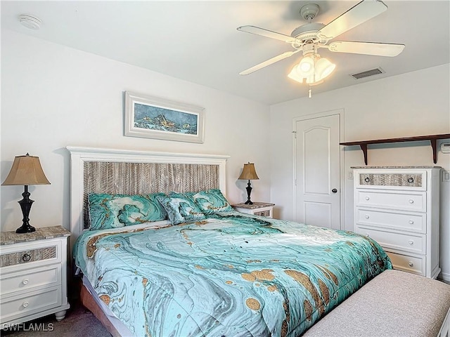 carpeted bedroom featuring ceiling fan