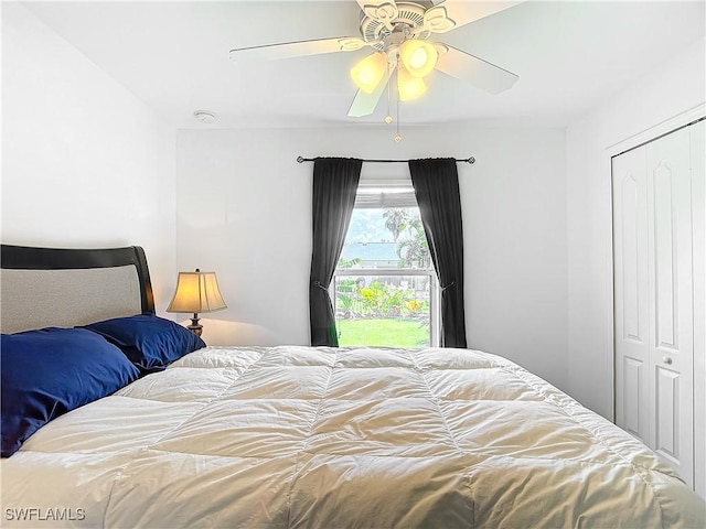 bedroom featuring a closet and ceiling fan