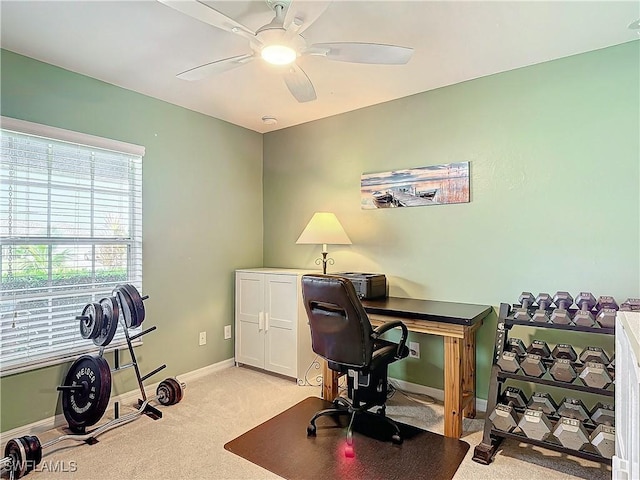 carpeted office with ceiling fan