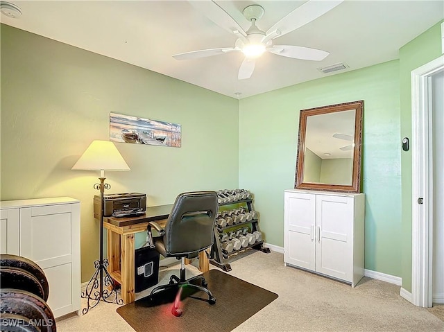 office with ceiling fan and light colored carpet