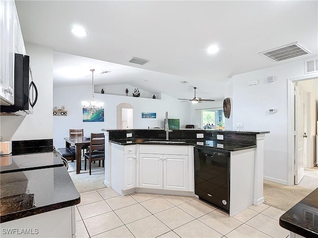 kitchen with light carpet, white cabinets, ceiling fan with notable chandelier, decorative light fixtures, and dishwasher