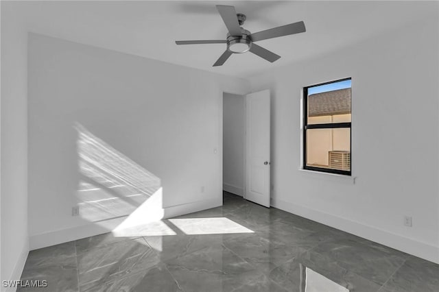 empty room featuring ceiling fan