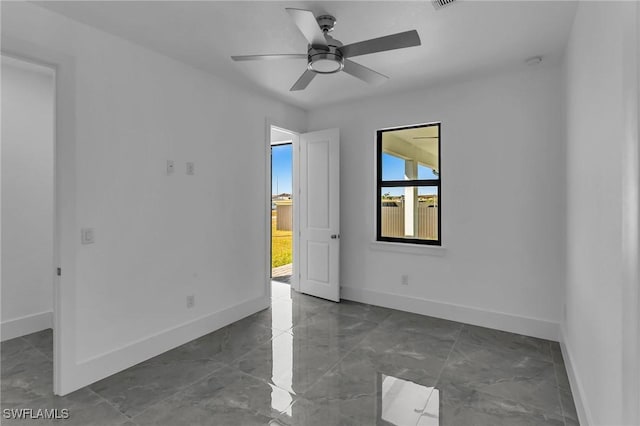 unfurnished room featuring ceiling fan