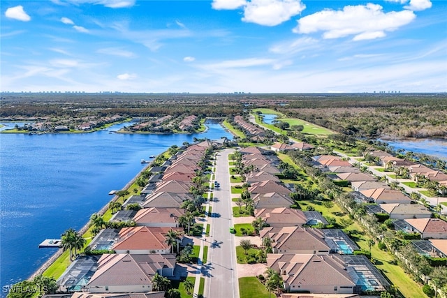 aerial view featuring a residential view and a water view