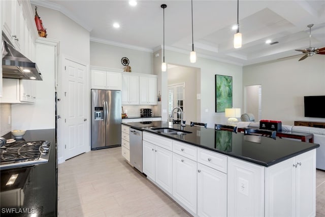 kitchen featuring sink, hanging light fixtures, a center island with sink, white cabinets, and appliances with stainless steel finishes