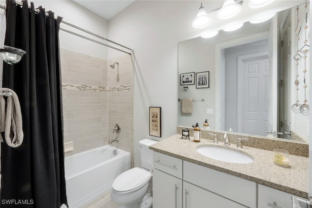 full bathroom with toilet, vanity, and shower / bathing tub combination
