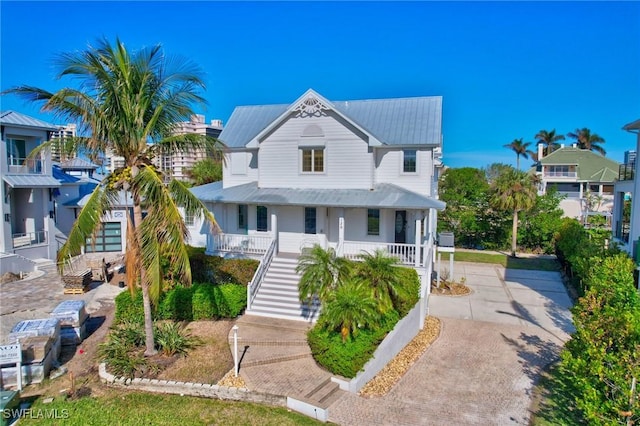 view of front of property featuring covered porch