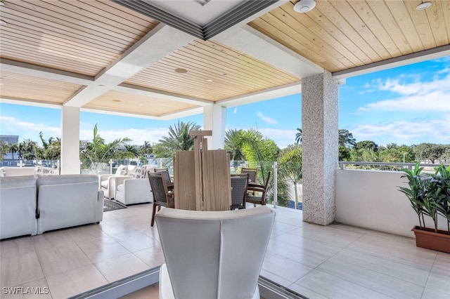 view of patio featuring a balcony