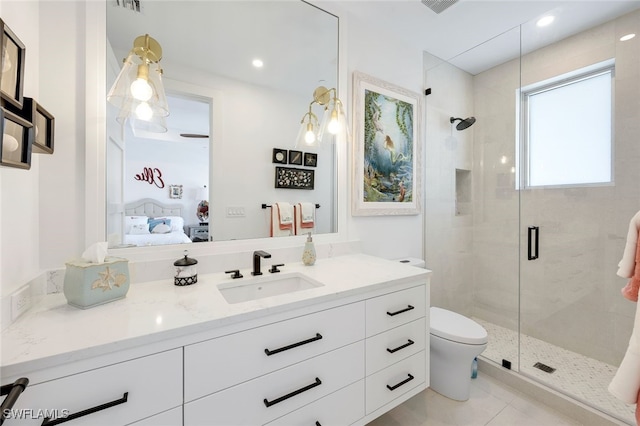 bathroom with walk in shower, tile patterned flooring, vanity, and toilet