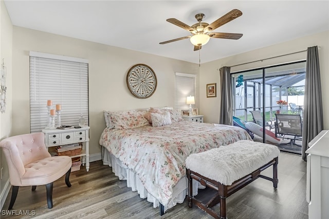 bedroom with access to exterior, ceiling fan, and hardwood / wood-style floors