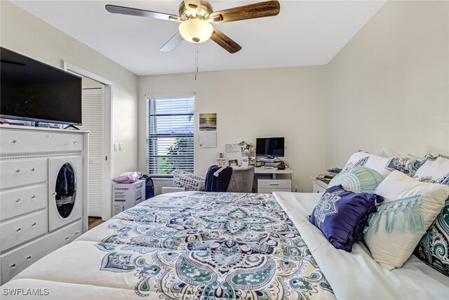 bedroom with ceiling fan and a closet