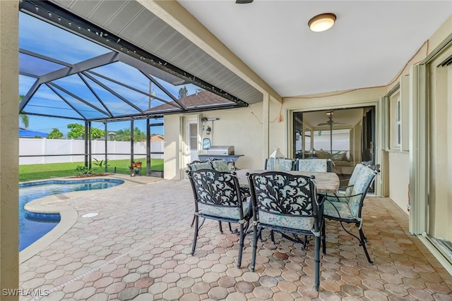 view of patio with a fenced in pool and a lanai