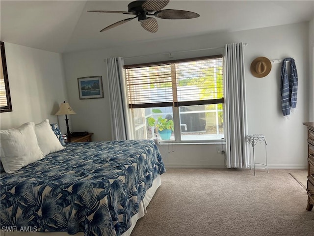 bedroom with carpet flooring, ceiling fan, and lofted ceiling