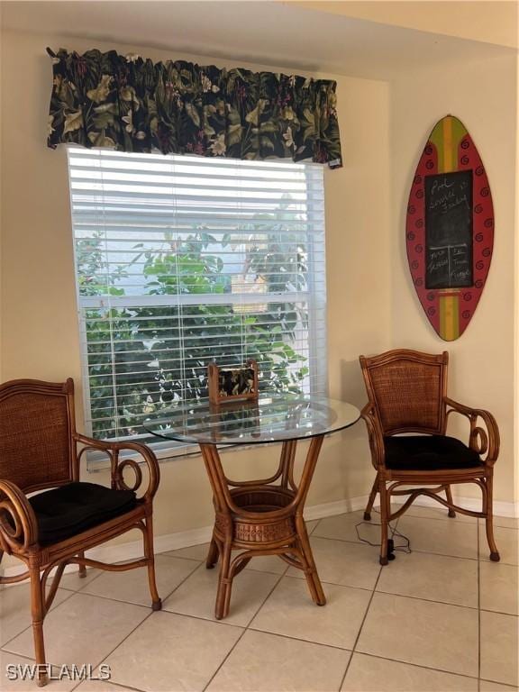 sitting room with light tile patterned floors