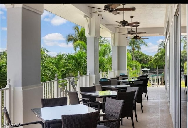 view of patio featuring ceiling fan