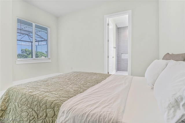 bedroom featuring ensuite bathroom