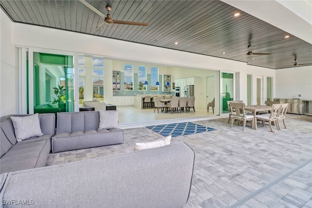 interior space featuring wooden ceiling, a ceiling fan, and recessed lighting