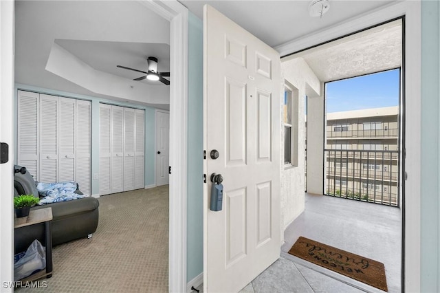 entryway with ceiling fan