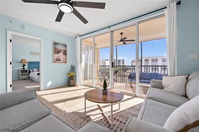 living room featuring floor to ceiling windows and plenty of natural light