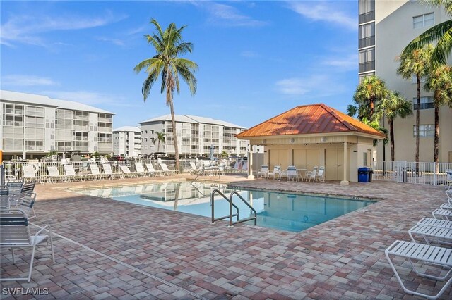 view of swimming pool with a patio area