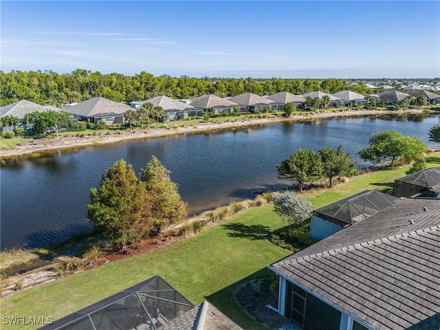 drone / aerial view with a water view