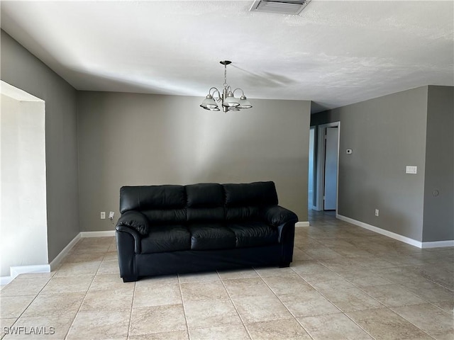 living room featuring an inviting chandelier