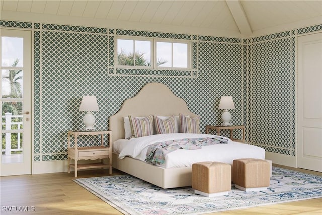 bedroom featuring hardwood / wood-style floors, beam ceiling, and tile walls