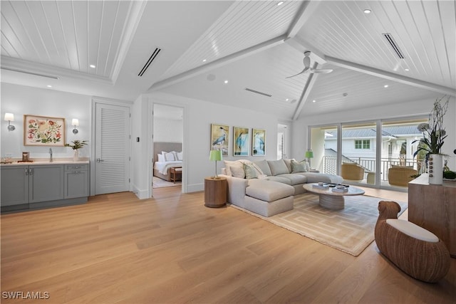 living room featuring light hardwood / wood-style floors, ceiling fan, wood ceiling, and vaulted ceiling with beams