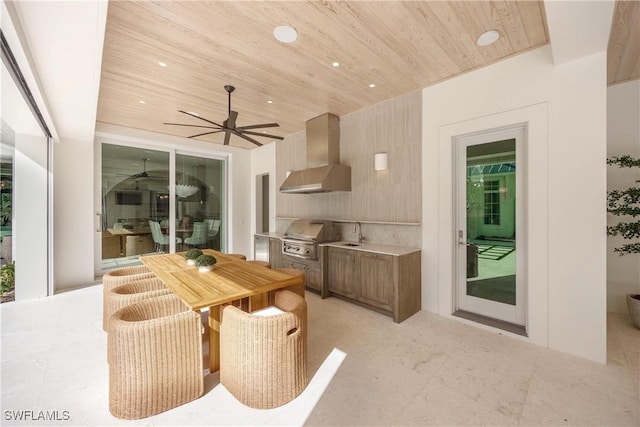 dining area featuring ceiling fan and wooden ceiling