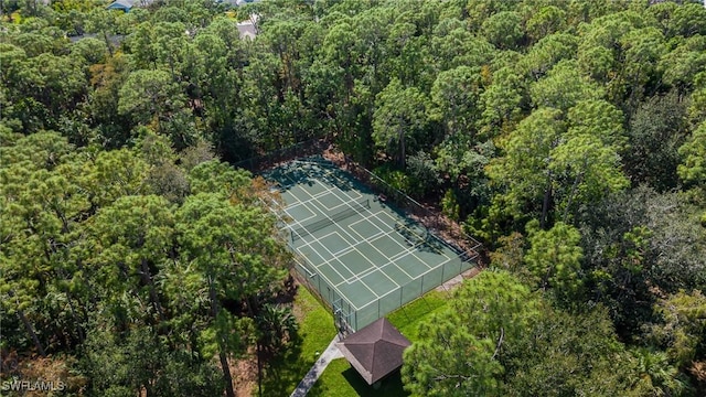 view of basketball court featuring tennis court