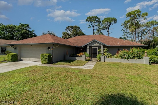 single story home with a front lawn and a garage