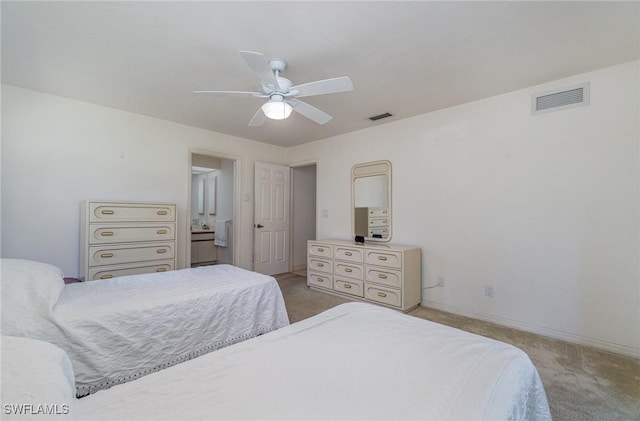 bedroom featuring ceiling fan and light carpet