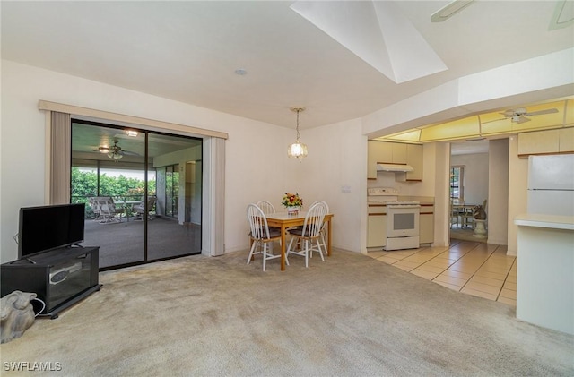 interior space with ceiling fan