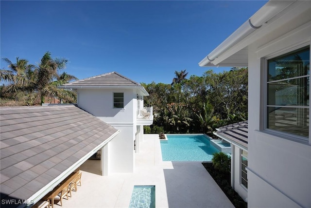 view of pool with a patio area