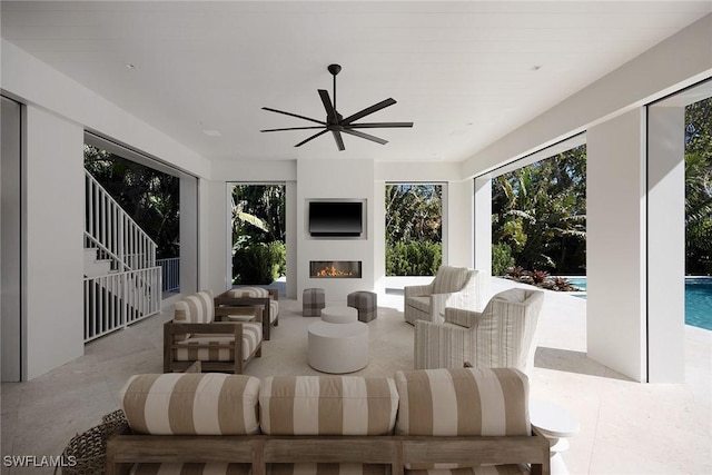 living room with ceiling fan