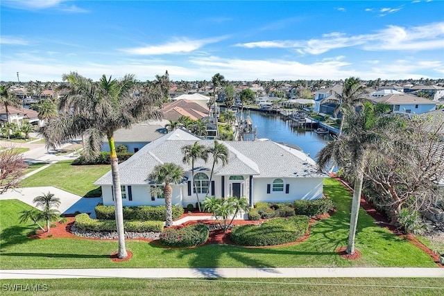 drone / aerial view featuring a water view