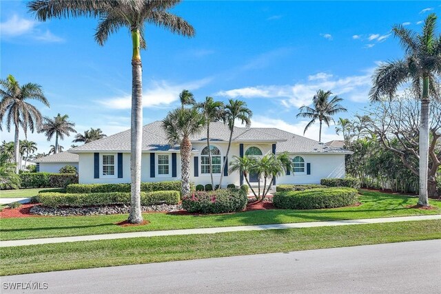 view of front of house with a front lawn