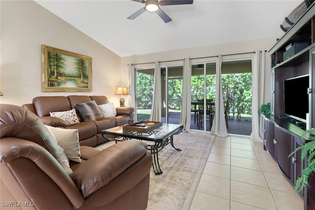 tiled living room featuring vaulted ceiling and ceiling fan