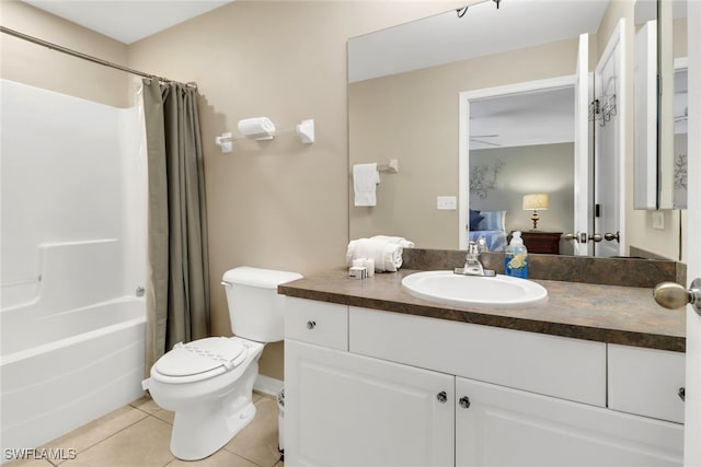 full bathroom featuring tile patterned floors, vanity, ceiling fan, shower / bathtub combination with curtain, and toilet