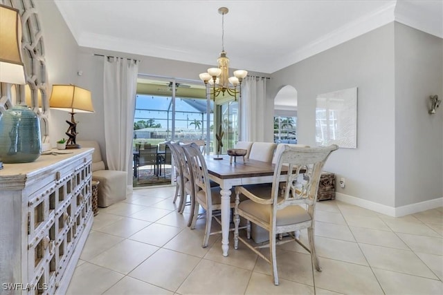 tiled dining space with a notable chandelier