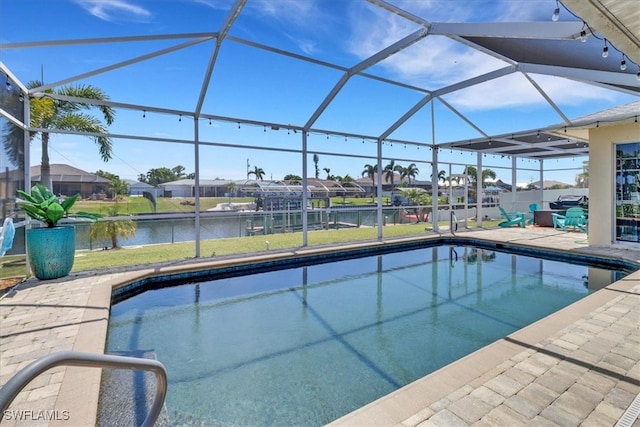 view of swimming pool with a lanai, a water view, and a patio